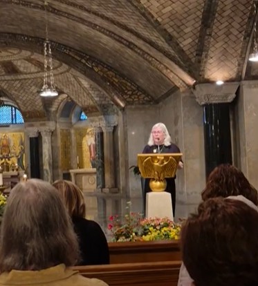 Beth speaking